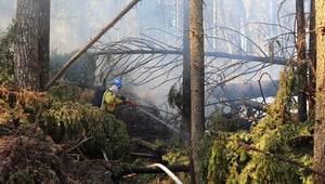 A firefighter responds to a wildfire detected on May 5, 2023 in the Edson Forest Area in central Alberta. Photo by Government of Alberta.